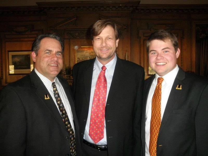 Chris Closson pictured center, with Bob Feld (left) and Sean Feld (right)